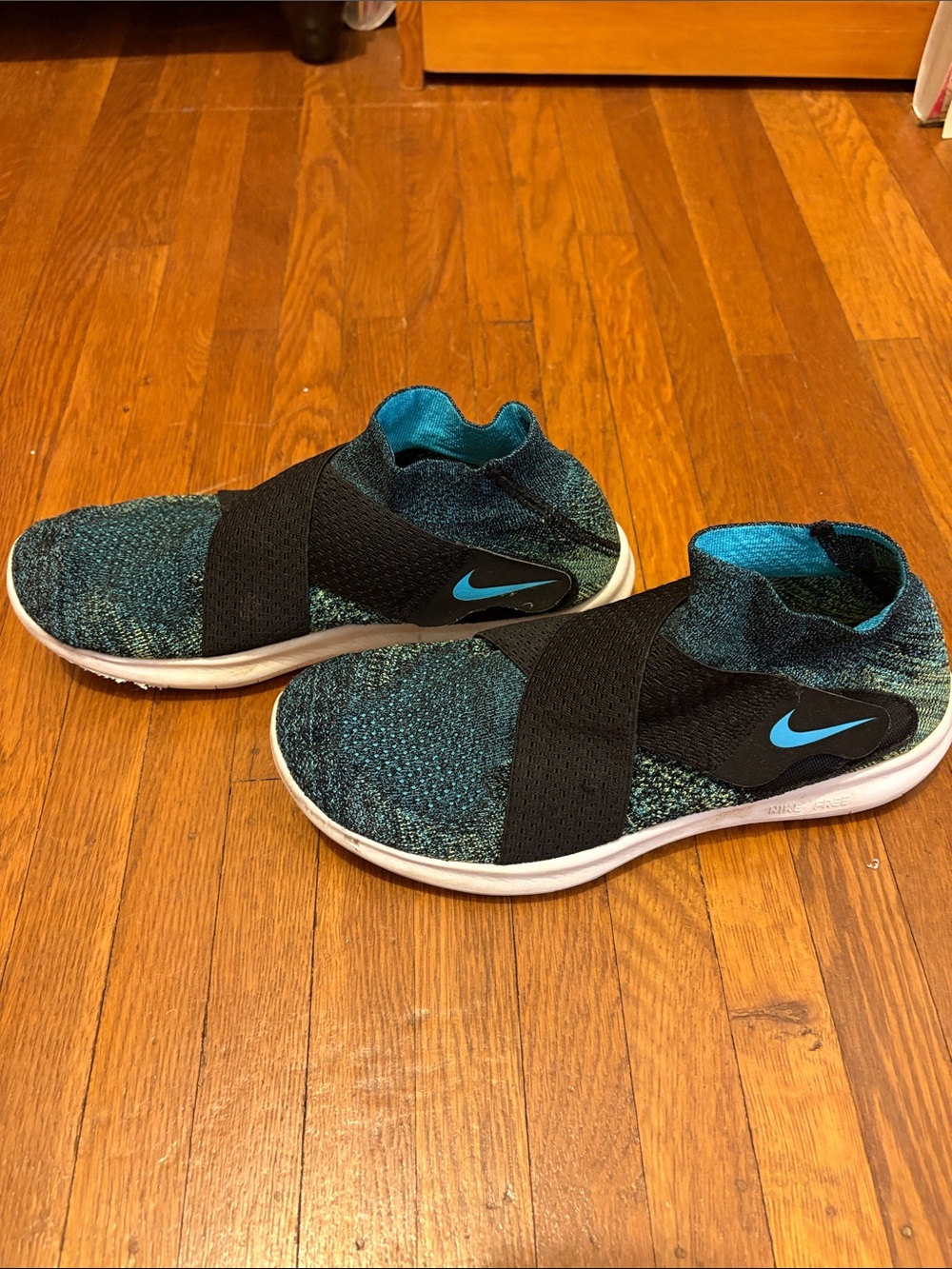 Nike Teal & Black Flyknit Slip-On Sneakers